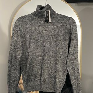 Turtlneck sweater.